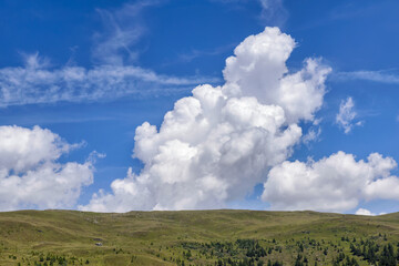 alpine landscape under blue sky with white clouds in summer, Millstatter Alpe, Millstatt am See, Carinthia, Austria