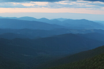 Sunset in the cloudy mountains of the Carpathians