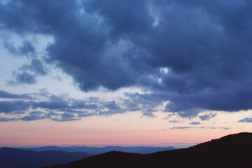 Sunset in the cloudy mountains of the Carpathians