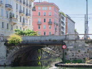 old bridge over the canal in Milan between elegant historic buildings.Italy