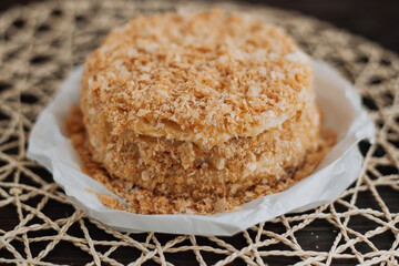 
homemade layer cake with crumb on textured background