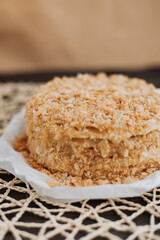 
homemade layer cake with crumb on textured background