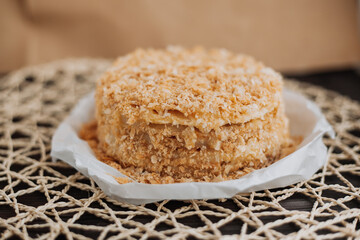 
homemade layer cake with crumb on textured background