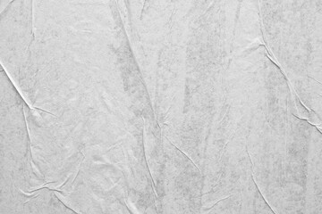 Blank white crumpled and creased paper poster texture background