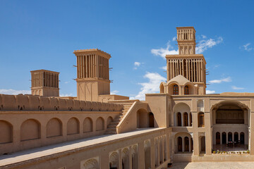 Historical house with wind towers known also as wind catchers, in Abarkuh, Iran