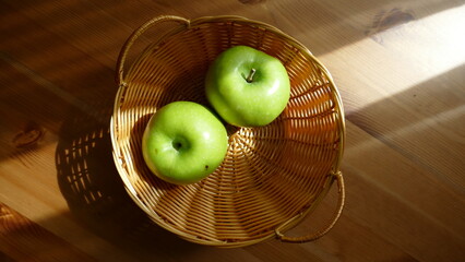 apple on a wooden table