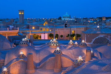 Domes of historical bath and view over the ancient city of Kashan at the twilight, Iran