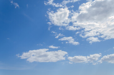 Naklejka na ściany i meble gray clouds against blue sky