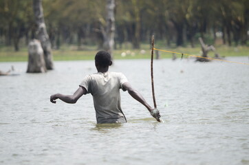 young man fishing