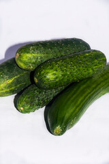 fresh cucumbers on a wooden table