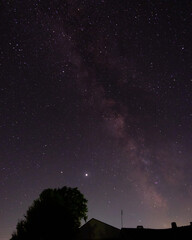 Fototapeta premium View of the milky way from the Northern hemisphere of the planet Earth. Beautiful bright night starry sky. Many different constellations in the black night sky. Galaxy with cosmic bodies.