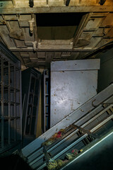 Broken electrical switchgear cabinets with control panels in abandoned bunker