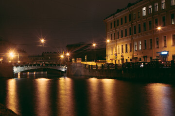 Bridge over the river. Night city landscape