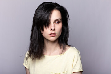 Fototapeta premium attractive woman in a yellow t-shirt