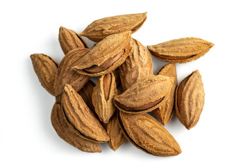 Inshell almonds isolated on a white background. A bunch of selected dried inshell almonds.