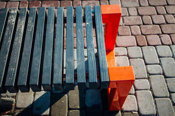 Nested pavers of various colors, around the grass is green, chic garden