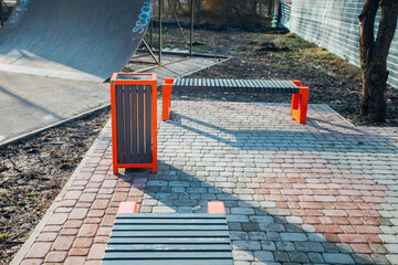 Nested pavers of various colors, around the grass is green, chic garden