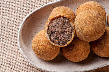 .Fried meat balls. Typical Brazilian bar snacks. Made of ground meat, breaded and fried.