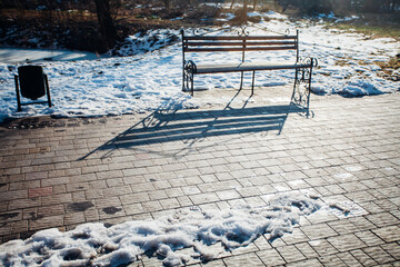 Nested pavers of various colors, around the grass is green, chic garden
