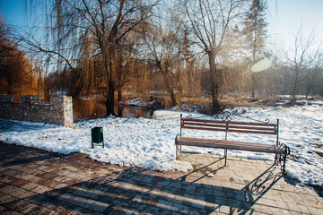 Nested pavers of various colors, around the grass is green, chic garden