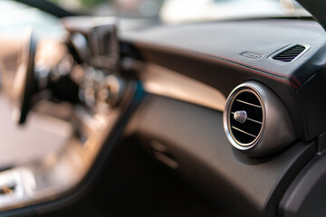 View of the front dashboard with air intake on the right side.