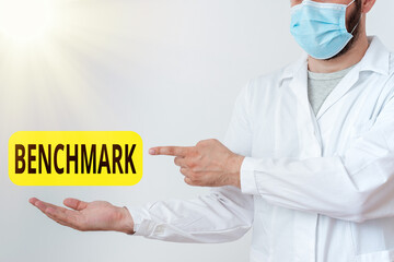 Word writing text Benchmark. Business photo showcasing something that serves as a standard by which...