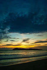 Fototapeta na wymiar Early Sunset over the Sea and Island 
