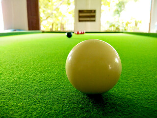 billiard table with balls