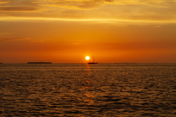 sailboat at sunset in key west