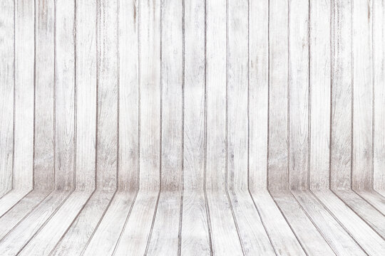 Old white wood wall panel pattern. Old white wooden floor texture for background. Empty of room.