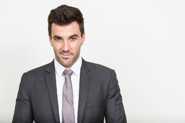 Portrait of handsome Hispanic businessman in suit