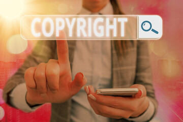 Conceptual hand writing showing Copyright. Concept meaning exclusive legal right to reproduce,...