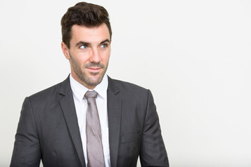 Portrait of handsome Hispanic businessman in suit