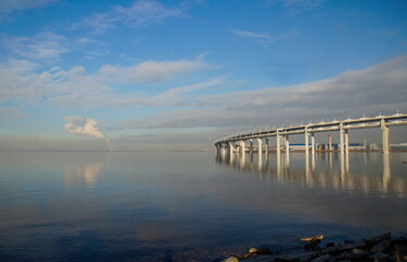 The overpass of the Western Expressway Diameter in St. Petersburg runs over the Neva bay, a view from the island of Canonersky