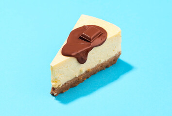 Cheesecake slice with chocolate topping. Slice of cheesecake with melted chocolate