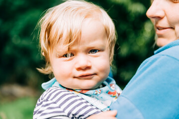 Baby boy with mother