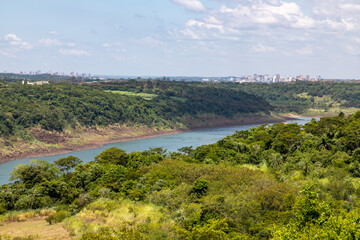 Fototapeta na wymiar Parana river with Ciudade del Leste and Foz do Iguacu