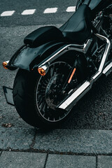 Fototapeta na wymiar Rear end of a cruising motorcycle