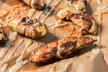 Cream Cheese Filled Bacon Wrapped Jalapeno Poppers