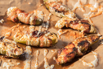 Cream Cheese Filled Bacon Wrapped Jalapeno Poppers