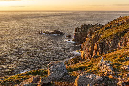 rocky coast of the sea on sunset