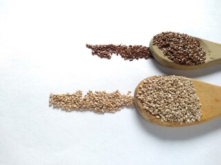 Wooden spoons with chia seeds and sesame