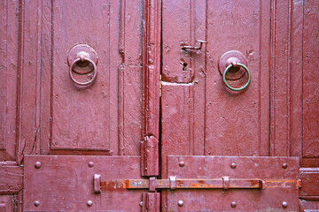 Locked and sealed door of abandoned monastery