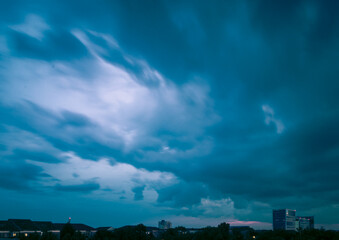 Fototapeta na wymiar clouds over city