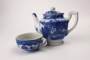 antique teapot with teacup