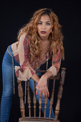 Beautiful Hispanic woman looking thoughtful