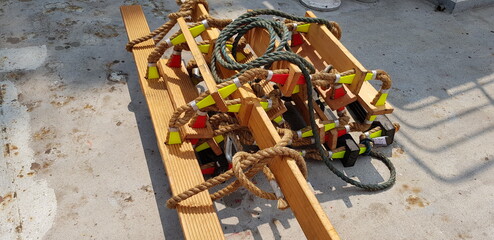 picture of a marine ladder used to usually embark on board boats while they are at sea,also called...
