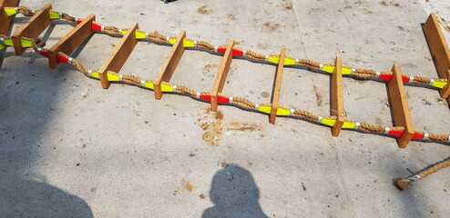 picture of a marine ladder used to usually embark on board boats while they are at sea,also called pilot ladder 