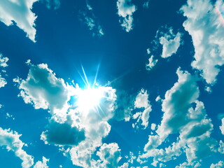 sunset and blue t sky fluffy clouds and sunlight beams skyline  nature landscape weather forecast
