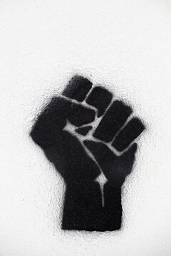 Fist symbol icon on a wall